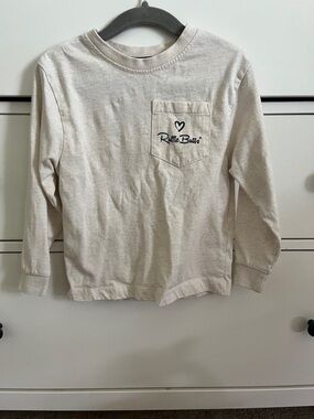 Ruffle Butts Cream Long Sleeve Pocket Tee with Heart Logo